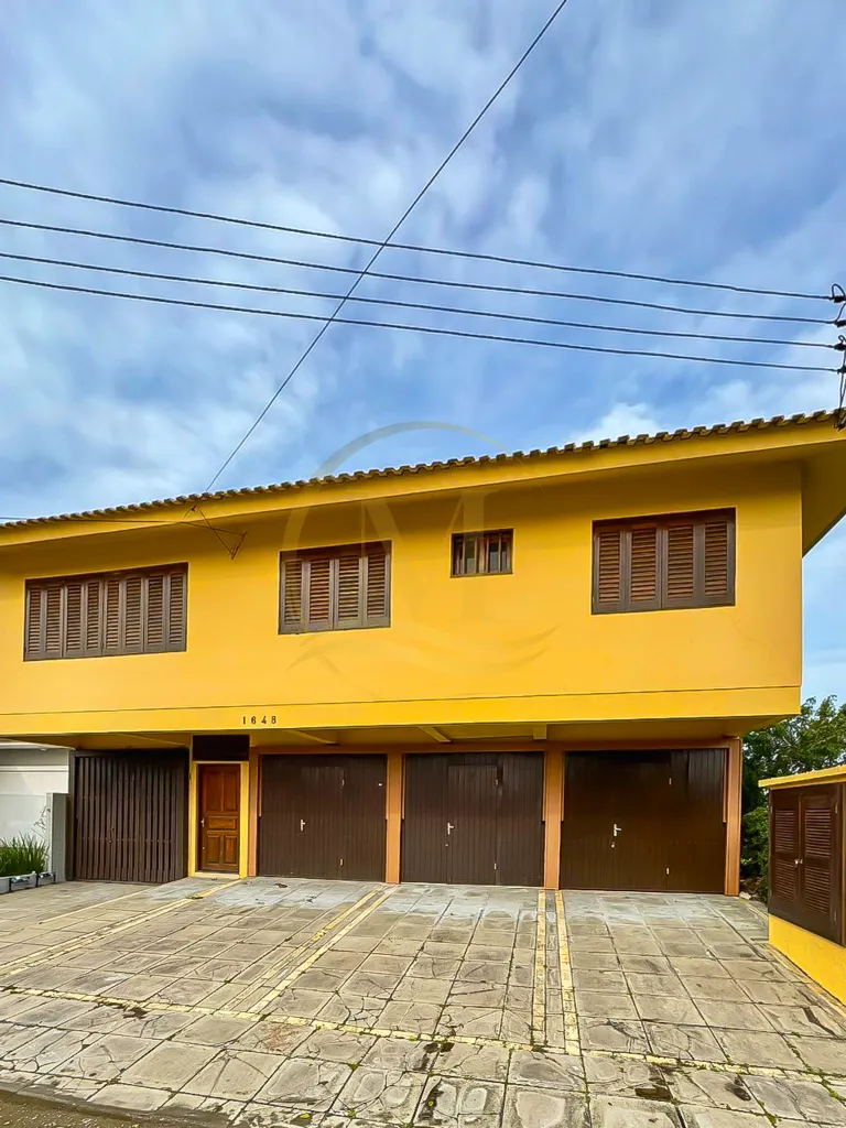 Sobrado Geminado à Venda em Xangri-Lá — foto 1