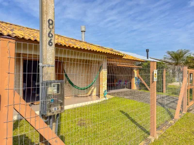 Casa com 3 dormitórios e piscina a poucas quadras do mar em Noiva do Mar — foto 4