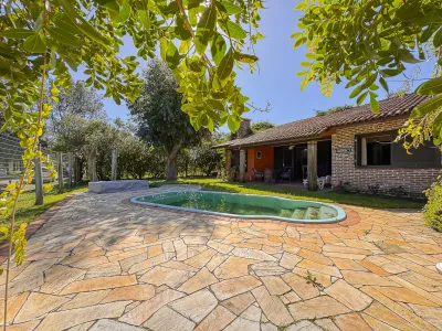 Casa mobiliada com piscina e 3 dormitórios em Atlântida — foto 4