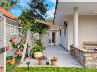 Casa mobiliada com 4 dormitórios e piscina aquecida em Atlântida — foto 5