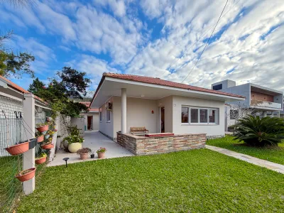 Casa mobiliada com 4 dormitórios e piscina aquecida em Atlântida — foto 2