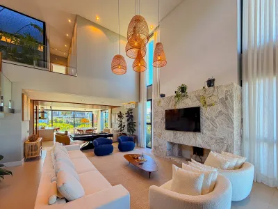 Casa beira lago com 5 suítes e 421 m² no Condomínio Sense — foto 2