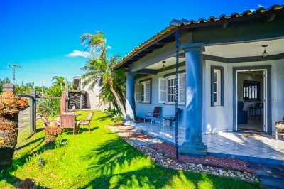 Casa com 3 dormitórios e suíte no bairro Remanso em Xangri-Lá — foto 4