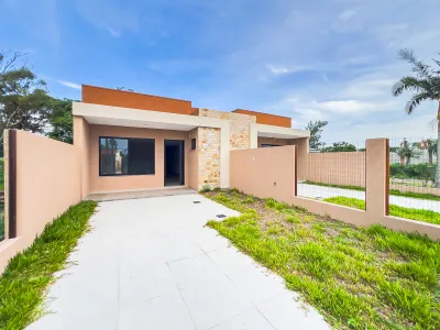 Casa com 2 dormitórios, amplo pátio e churrasqueira na Marina — foto 2