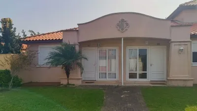 Casa com 3 Dormitórios em Condomínio Fechado em Xangri-Lá — foto 3