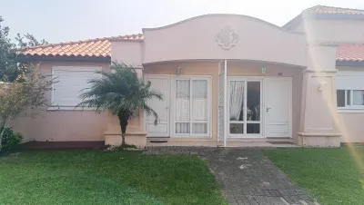 Casa com 3 Dormitórios em Condomínio Fechado em Xangri-Lá — foto 2