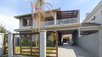 Casa Ampla com 6 Dormitórios no Centro de Xangri-Lá — foto 2