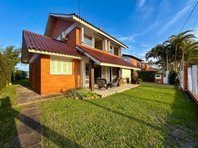 Casa com 3 Dormitórios e Piscina à Venda em Atlântida, Xangri-Lá — foto 4