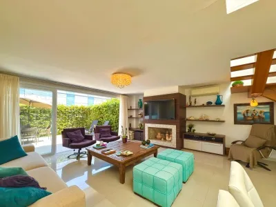 Casa em condomínio beira-mar com 3 suítes no Condomínio Solanas na Praia de Atlântida — foto 3