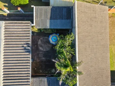 Casa com 4 dormitórios e amplo terreno à venda em Atlântida — foto 5