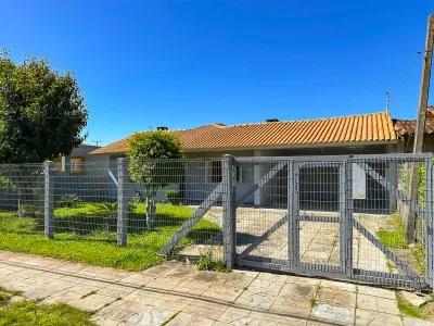 Casa com 3 dormitórios e amplo terreno no Bairro Centro em Xangri-Lá — foto 2