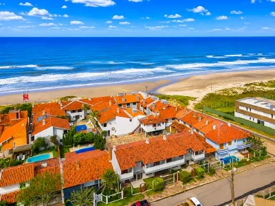 Duplex mobiliado com 2 suítes à beira-mar no Centro de Xangri-Lá — foto 3