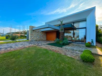 Casa frente lago no Condomínio Villaggio Atlântida, em Atlântida, Xangri-Lá — foto 2