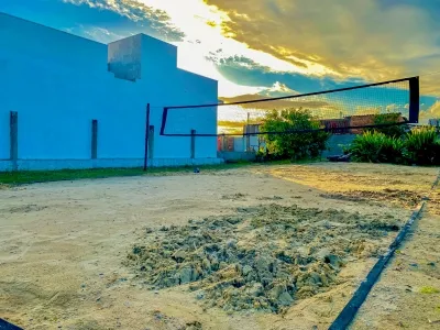Casa em dois lotes com piscina e quadra no Arpoador — foto 4