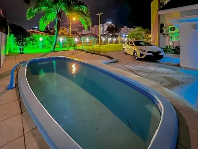 Sobrado mobiliado de esquina com 4 dormitórios, piscina e amplo terreno em Atlântida — foto 5
