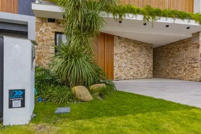 Casa diferenciada em condomínio Sunset 4 suítes e 263m² privativos — foto 3