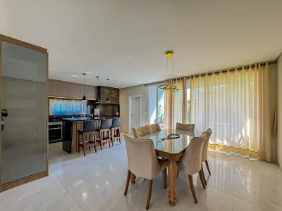 Casa mobiliada com 3 dormitórios e amplo terreno no Centro de Atlântida — foto 5