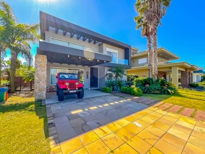 Casa Beira Lago à venda com 5 Suítes e Piscina Aquecida no Condomínio Villaggio - Xangri-lá — foto 2