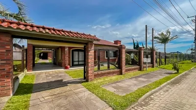 Casa em Rainha do Mar | 3 dormitórios, anexo e terreno de 360 m² — foto 2