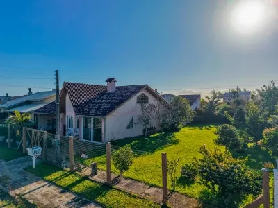 Casa à Venda com 4 Dormitórios em 2 Terrenos em Xangri-lá — foto 2