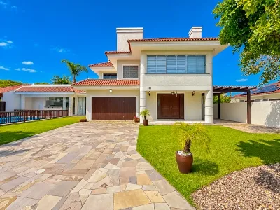 Sobrado em Atlântida | 4 dormitórios (3 suítes), piscina, salão de festas e 380 m² — foto 2