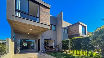 Casa na Divisa de Atlântida e Xangri-Lá | 4 dormitórios (2 suítes), piscina com deck e 196 m² — foto 3
