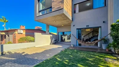 Casa na Divisa de Atlântida e Xangri-Lá | 4 dormitórios (2 suítes), piscina com deck e 196 m² — foto 4