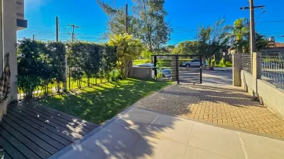 Casa na Divisa de Atlântida e Xangri-Lá | 4 dormitórios (2 suítes), piscina com deck e 196 m² — foto 5
