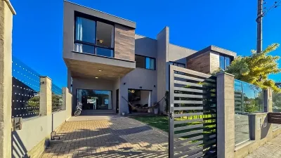 Casa na Divisa de Atlântida e Xangri-Lá | 4 dormitórios (2 suítes), piscina com deck e 196 m² — foto 2